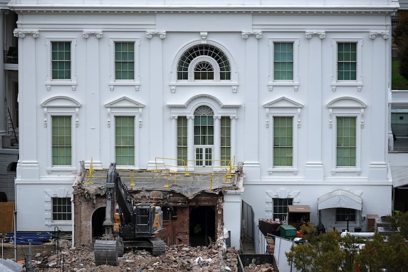 An excavator sits on the rubble on October 28 after the East Wing of the White House was demolished to make room for Donald Trump's $300 million ballroom.