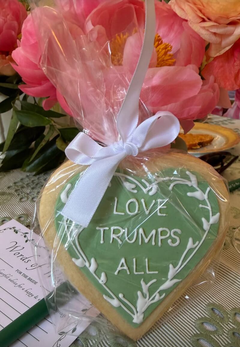 The irony was in overdrive as 'Love Trumps All' biscuits were served to guests.