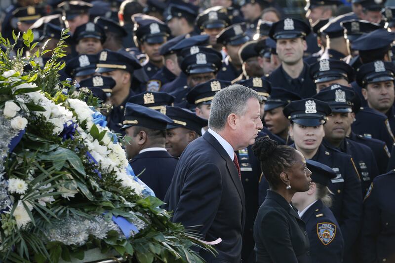 galleries/2014/12/27/the-nypd-says-farewell-to-officer-ramos/141227-police-funeral-07_gtesr3