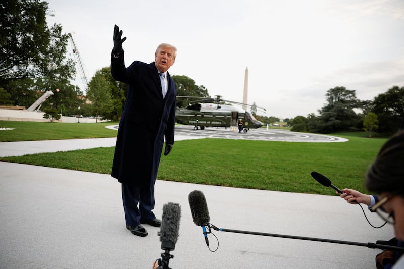 President Donald Trump speaks to the media as he returns to the White House after greeting Chinese President Xi Jinping at Joint Base Andrews, on the South Lawn of the White House in Washington, DC, US, September 23, 2026.