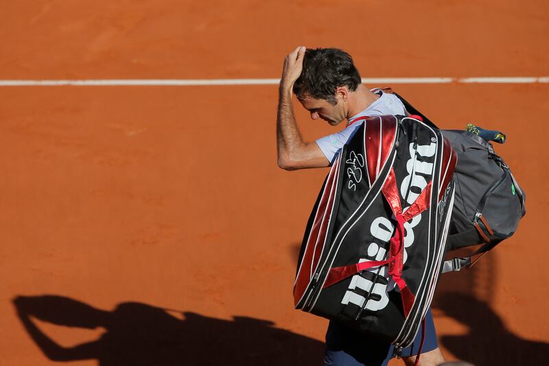 galleries/2013/06/09/roger-federer-a-history-in-hair-days-photos/130607-federer-hair-days-01-tease_fzwe6i