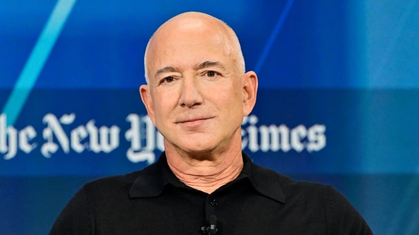 NEW YORK, NEW YORK - DECEMBER 04: Jeff Bezos speaks onstage during The New York Times Dealbook Summit 2024 at Jazz at Lincoln Center on December 04, 2024 in New York City. (Photo by Eugene Gologursky/Getty Images for The New York Times)