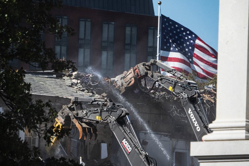 Heavy equipment demolishes a portion of the East Wing of the White House