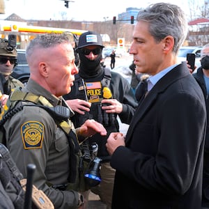 U.S. Border Patrol Chief Gregory Bovino is confronted by Evanston Mayor and congressional candidate Daniel Biss