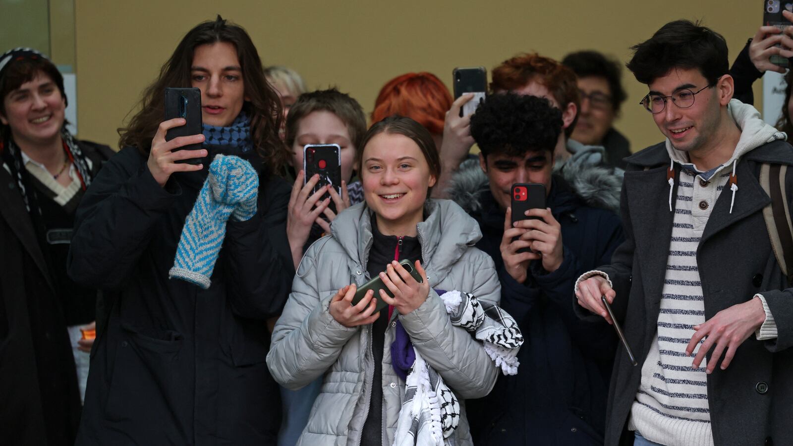 Swedish environmental activist Greta Thunberg (C) fellow defendants and supporters leave Westminster Magistrates Court in London on February 2, 2024, on the second day of their public order offence trial.
