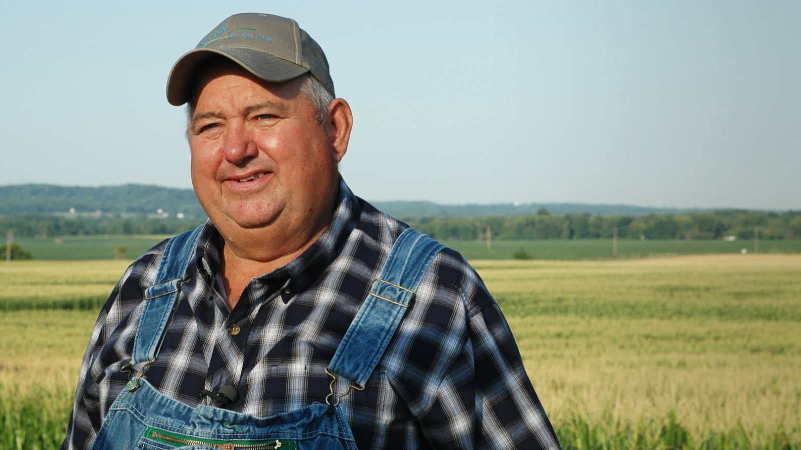 David Brandt stands in front of a field