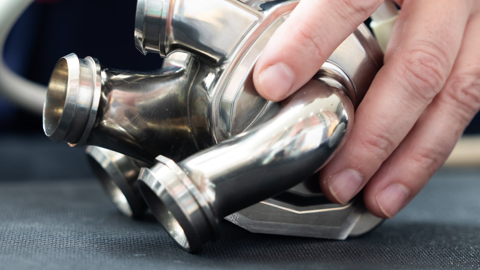 A close-up of a titanium BiVACOR heart held by a doctor in Houston, Texas.