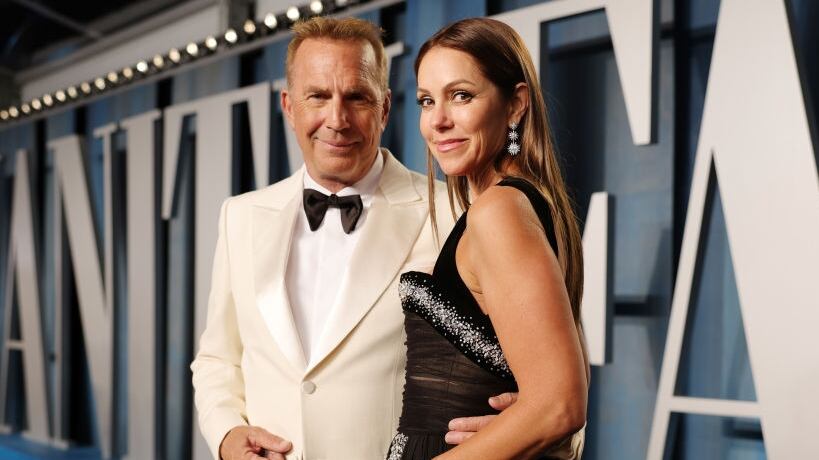 Kevin Costner and Christine Baumgartner attend the 2022 Vanity Fair Oscar Party hosted by Radhika Jones at Wallis Annenberg Center for the Performing Arts on March 27, 2022 in Beverly Hills, California.
