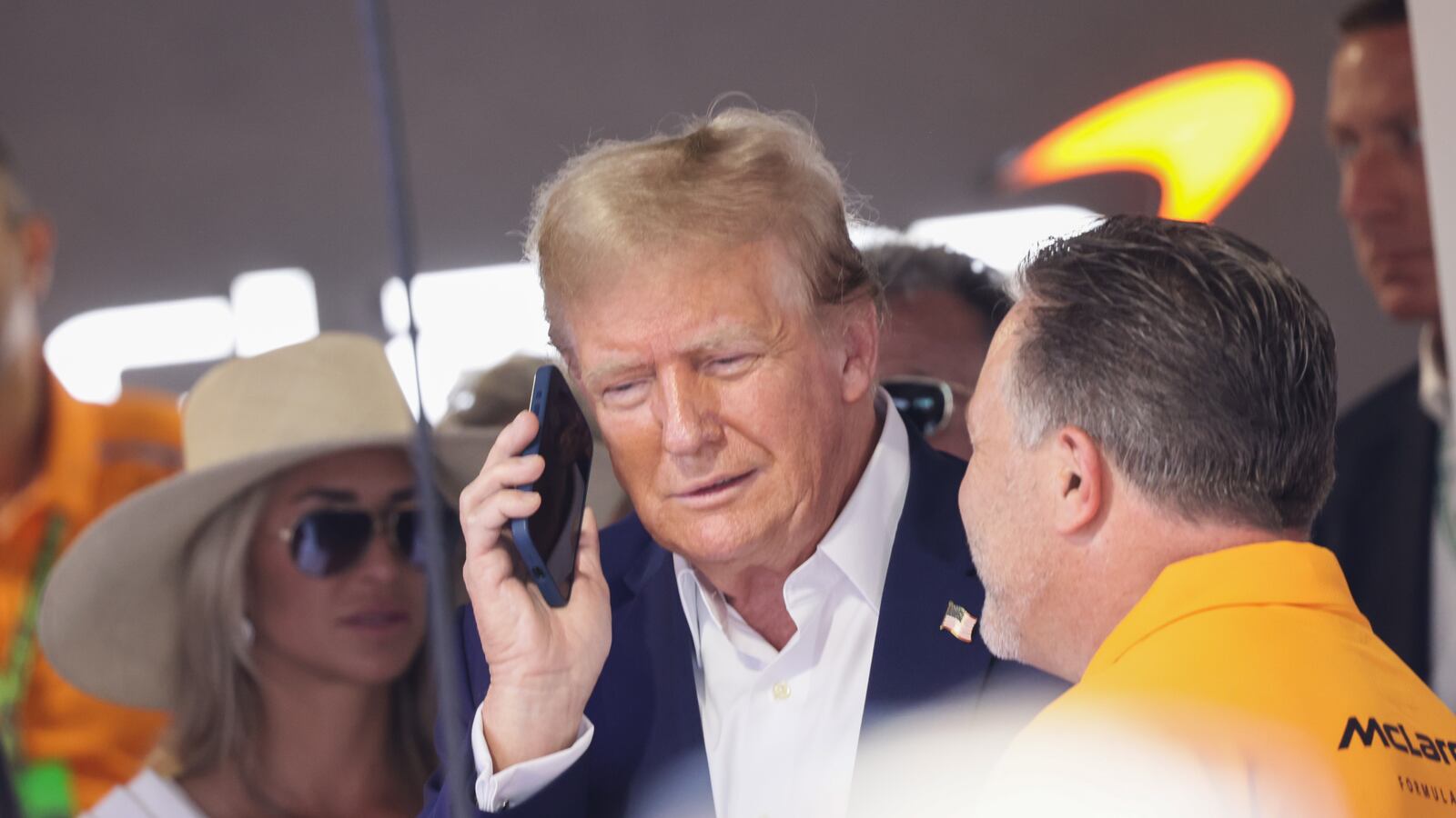 Donald Trump, 45th President of the United States, and Zak Brown, McLaren Chief Executive Officer, talk in the McLaren garage before the Formula 1 Miami Grand Prix at Miami International Autodrome in Miami, United States on May 5, 2024. (Photo by Jakub Porzycki/NurPhoto via Getty Images)