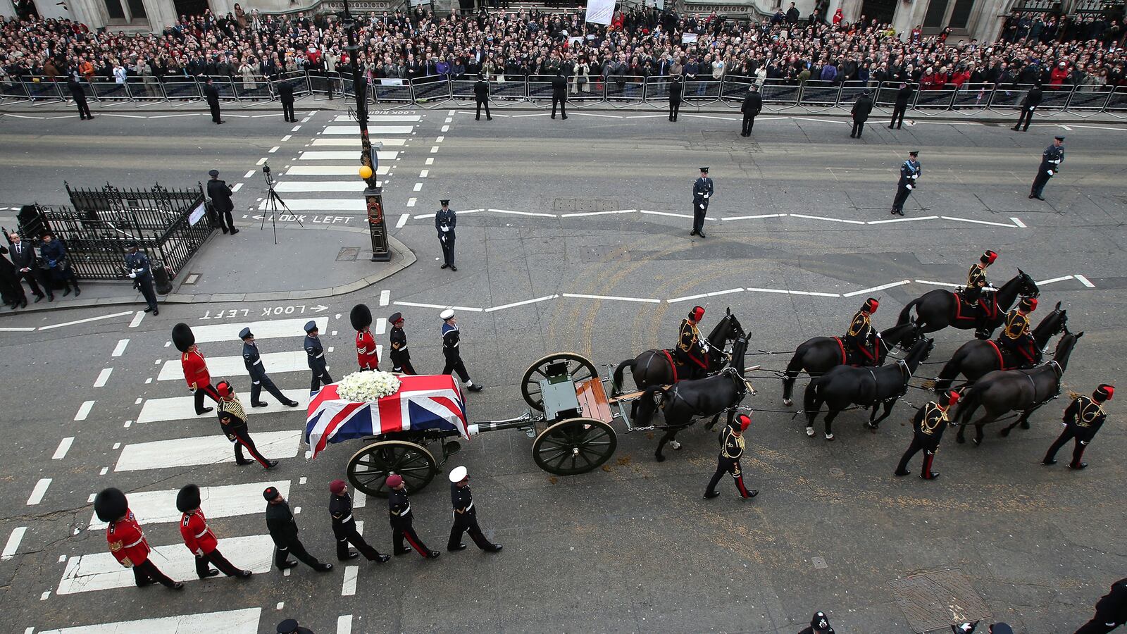 galleries/2013/04/17/london-crowds-and-dignitaries-pay-their-respects-at-margaret-thatcher-s-funeral/thatcher-funeral-01_okn8mu