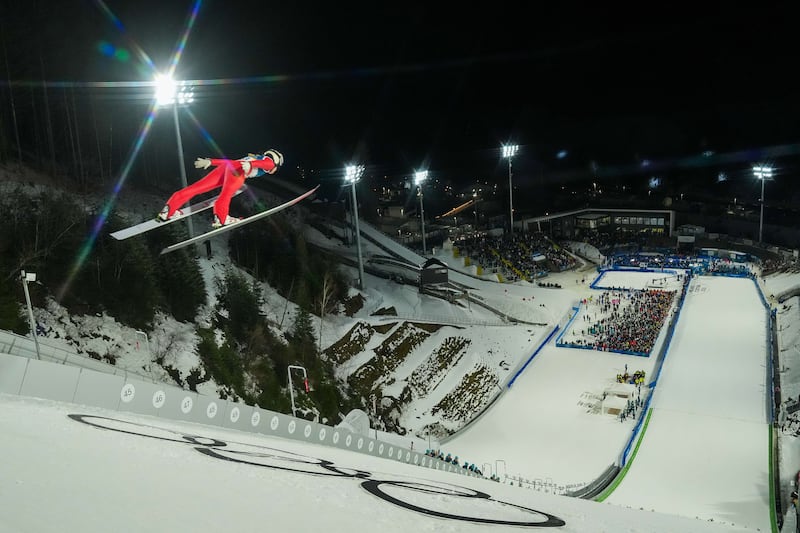 VAL DI FIEMME, ITALY - FEBRUARY 7: Sina Arnet of Team Switzerland competes on day one of the Milano Cortina 2026 Winter Olympic games at Predazzo Ski Jumping Stadium on February 7, 2026 in Val di Fiemme, Italy. (Photo by Michel Cottin/Agence Zoom/Getty Images)