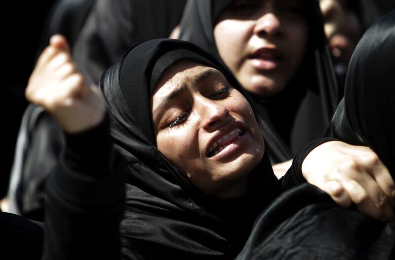galleries/2011/04/21/faces-of-the-mideast-revolutions/mideast-revolutions-13_qtrbkp