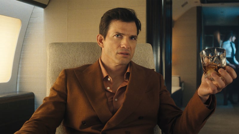 Ashton Kutcher as The Corporation.