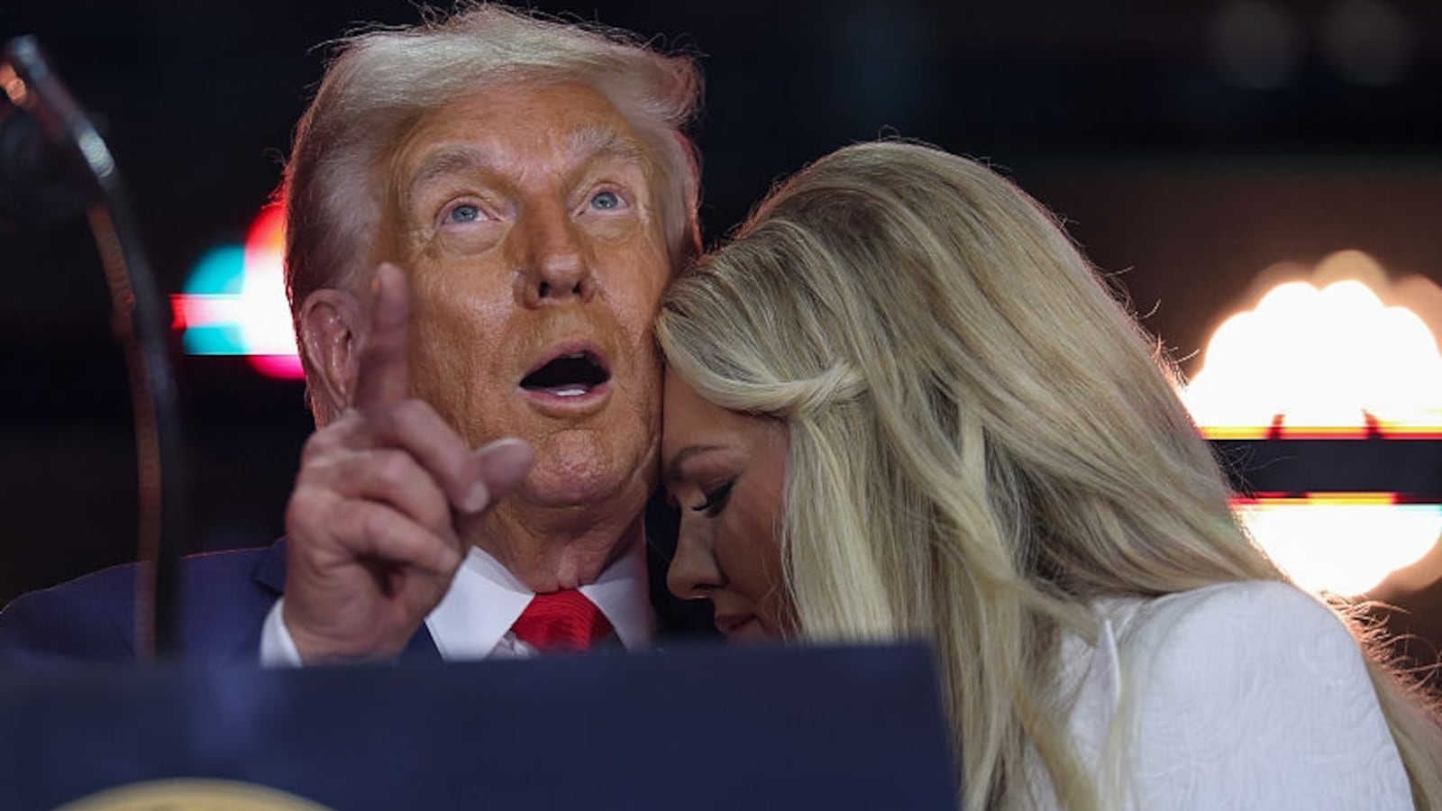 Erika Kirk joins U.S. President Donald Trump onstage during the memorial service for political activist Charlie Kirk at State Farm Stadium on September 21, 2025 in Glendale, Arizona. Kirk, the CEO and co-founder of Turning Point USA, was shot and killed on September 10th while speaking at an event during his "American Comeback Tour" at Utah Valley University. (Photo by Win McNamee/Getty Images)