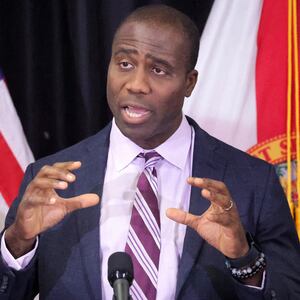Florida Surgeon General Dr. Joseph Ladapo delivers remarks during a bill-signing ceremony with Florida Gov. Ron DeSantis on April 8, 2024, in Sanford, Florida. Ladapo, a health care skeptic who has been mentioned for possible jobs in the Trump administration, issued an advisory Friday, Nov. 22, 2024, calling on Florida communities to stop fluoridating their water supplies.(Joe Burbank/Orlando Sentinel/Tribune News Service via Getty Images)