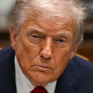 US President Donald Trump takes part in a roundtable discussion in the Roosevelt Room of the White House in Washington, DC, on December 10, 2025. (Photo by ANDREW CABALLERO-REYNOLDS / AFP via Getty Images)