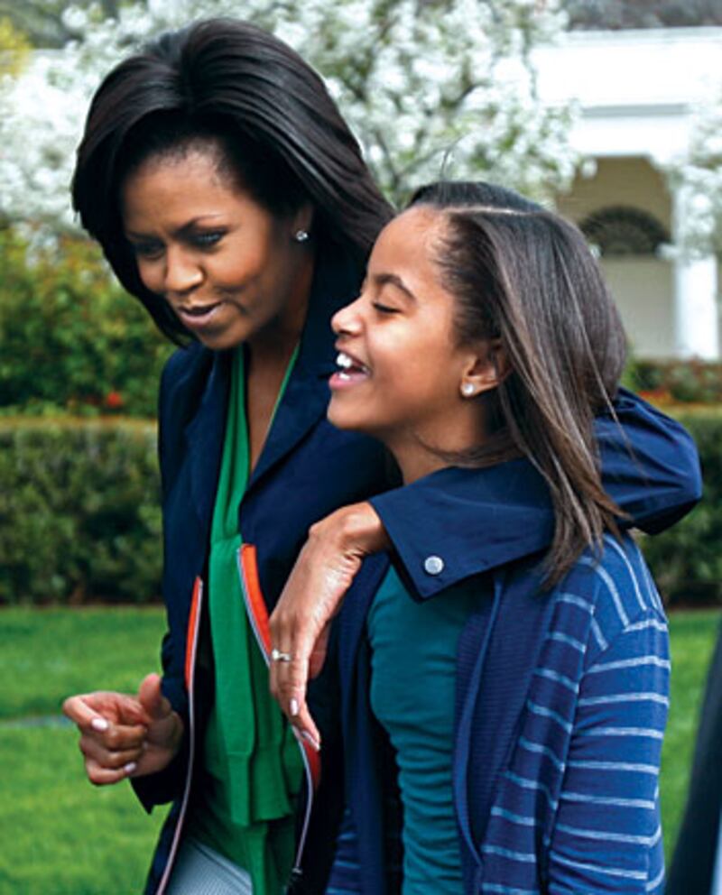 galleries/2009/11/25/a-pictorial-ode-to-michelle-obama/crouch-michelle-obama-10_ok6su5