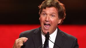 Tucker Carlson speaks during the public memorial service for right-wing activist Charlie Kirk at State Farm Stadium in Glendale, Arizona, on September 21, 2025.