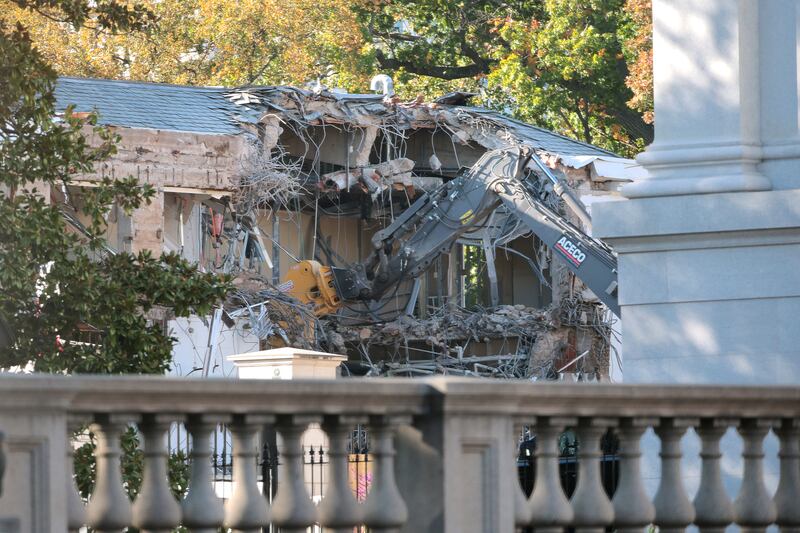 Workers demolish the facade of the East Wing of the White House on Oct. 20, 2025 in Washington, DC. The demolition is part of U.S. President Donald Trump's plan to build a ballroom reportedly costing $250 million on the eastern side of the White House.