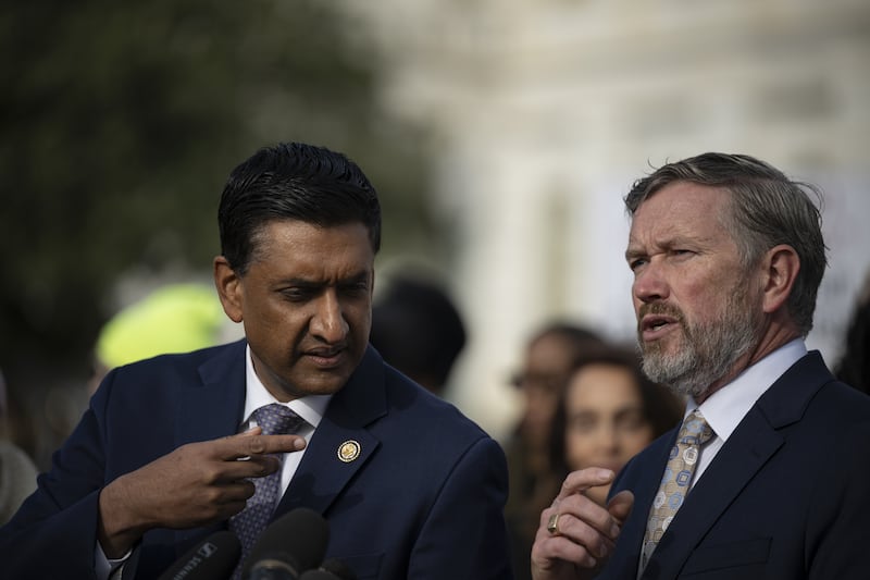 Rep. Ro Khanna and Thomas Massie speak during the press conference on the Epstein Files Transparency Act with the Epstein abuse survivors at the US Capitol in Washington, DC, on November 18, 2025.