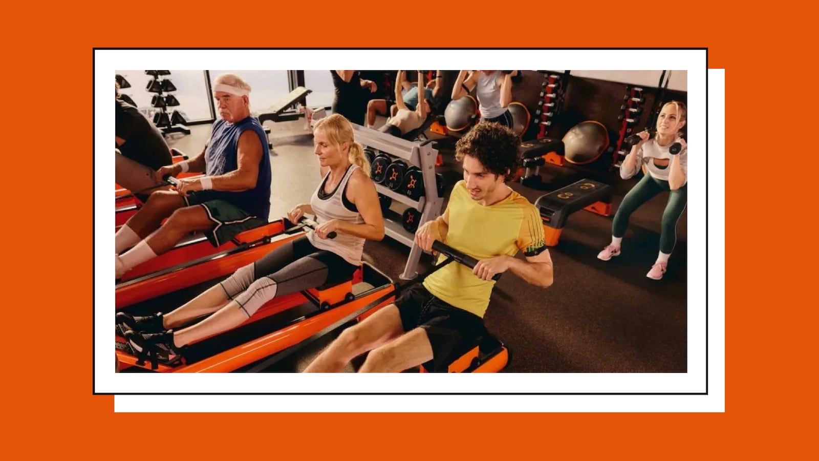 People rowing in an Orangetheory class.