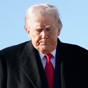 FORT BRAGG, NORTH CAROLINA - FEBRUARY 13: U.S. President Donald Trump prepares to board Air Force One at Pope Army Airfield after a visit to the Fort Bragg U.S. Army base on February 13, 2026 in Fort Bragg, North Carolina. Trump visited the base to honor special forces involved in the military operation in Venezuela in early 2026. (Photo by Nathan Howard/Getty Images)