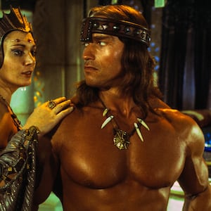 Arnold Schwarzenegger and Sarah Douglas on the set of "Conan the Destroyer" in 1983.