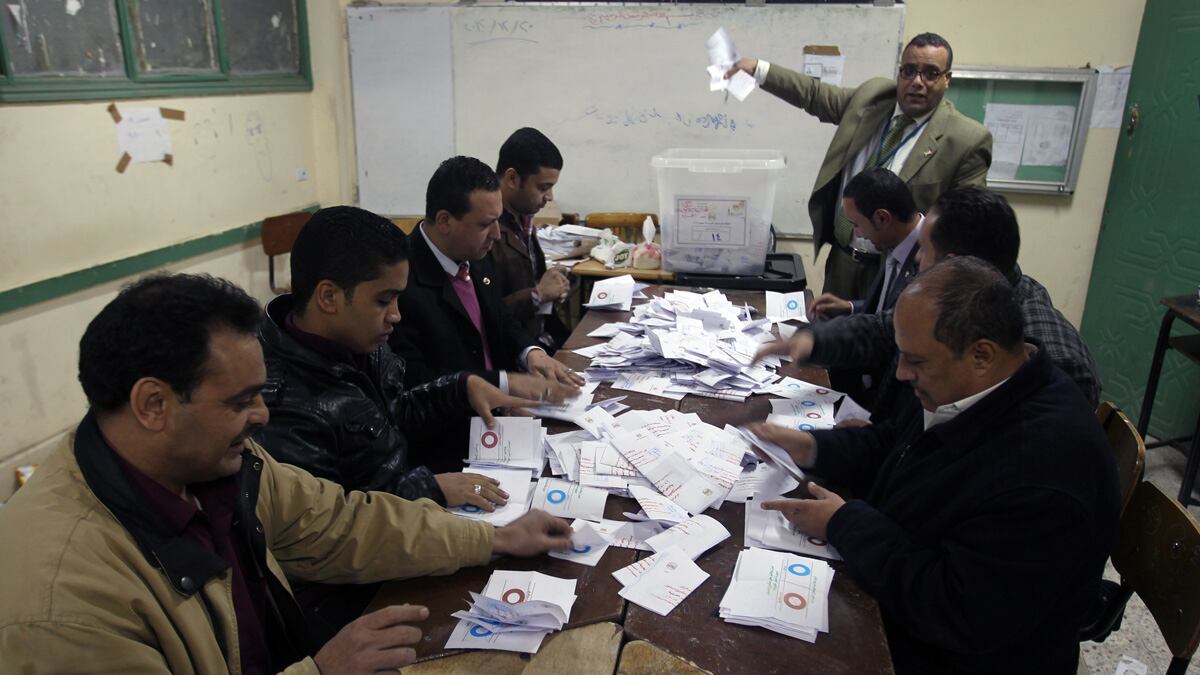 cheats/2012/12/26/morsi-signs-constitution/morsi-signs-constitution-cheat_qfyf0c