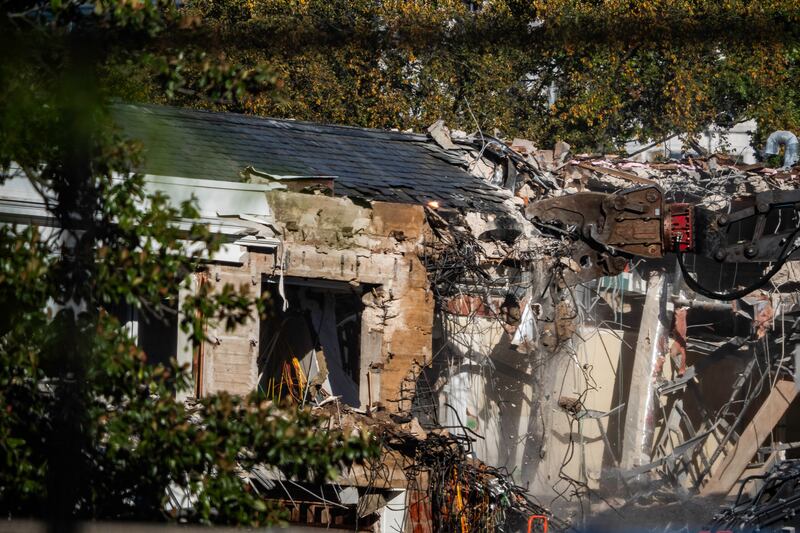Part of the East Wing of the White House is demolished by work crews during construction to build a new ballroom