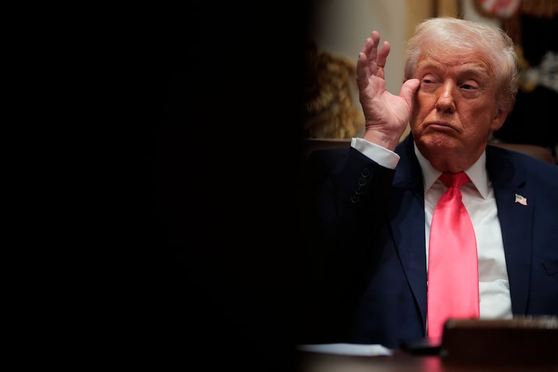 President Donald Trump attends a meeting of his Cabinet in the Cabinet Room of the White House on December 02, 2025 in Washington, DC.