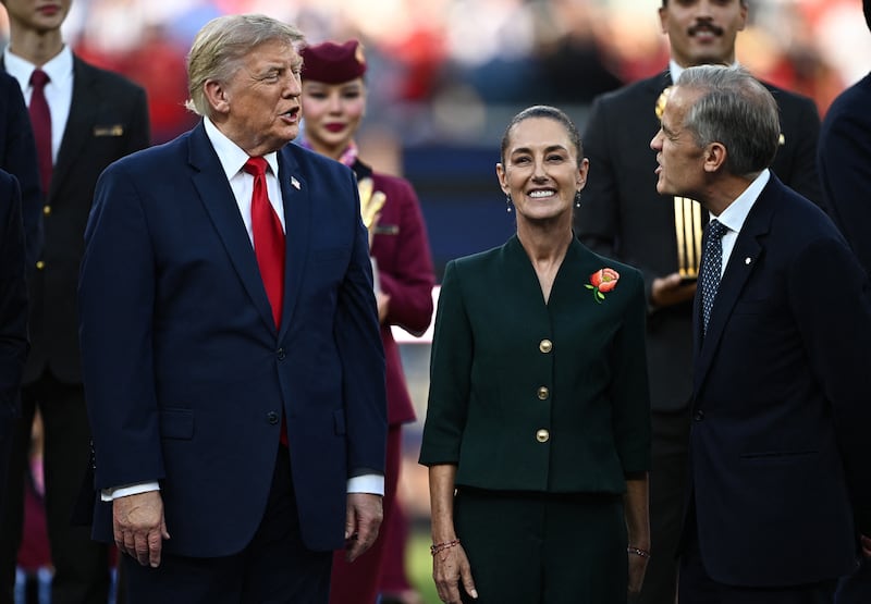Soccer Football - FIFA World Cup 2026 - Final - Spain v Argentina - New York/New Jersey Stadium, East Rutherford, New Jersey, U.S. - July 19, 2026 U.S. President Donald Trump, Mexican President Claudia Sheinbaum and Canada's Prime Minister Mark Carney during the trophy presentation after the match REUTERS/Dylan Martinez