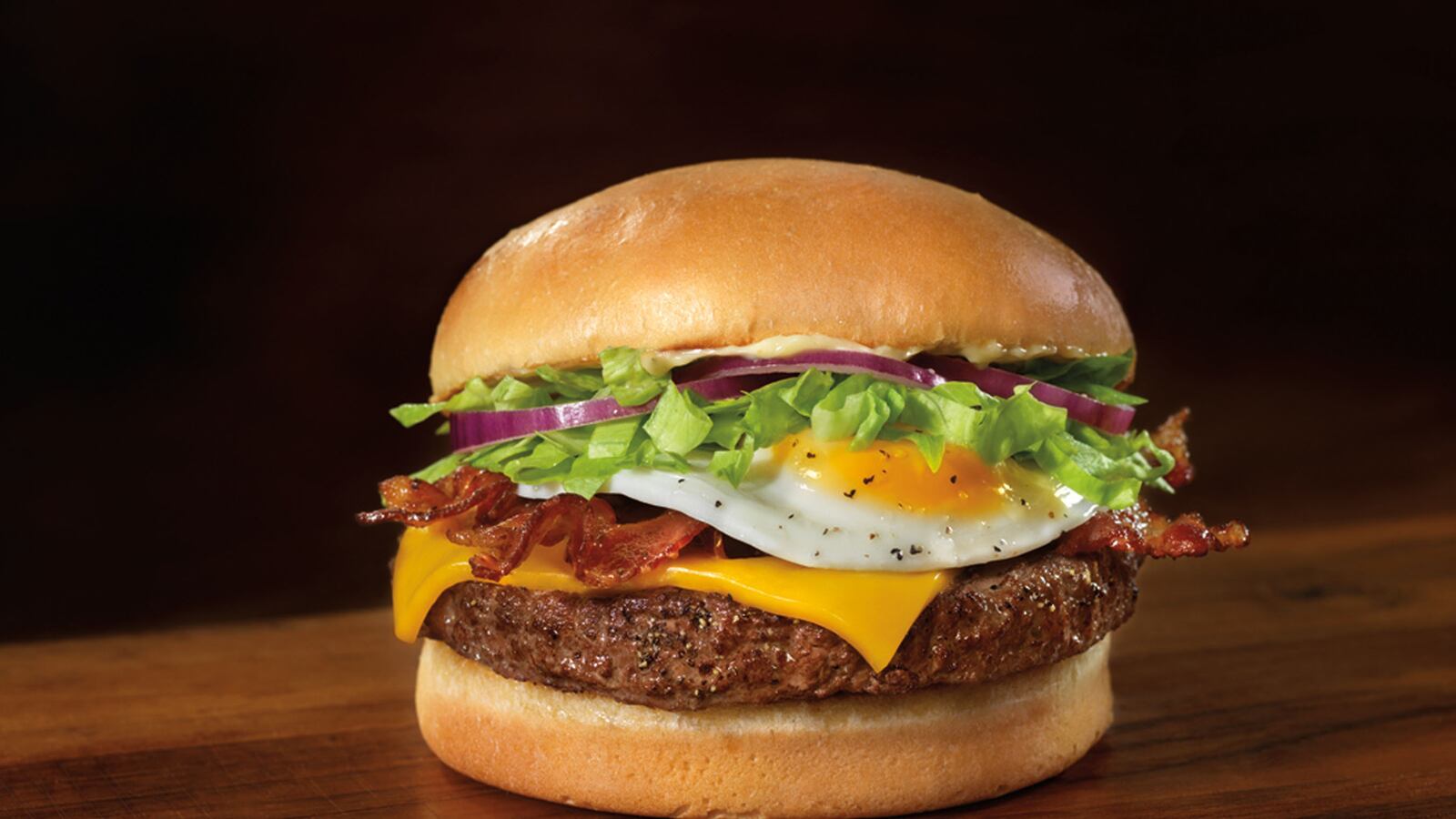 cheats/2013/08/24/woman-dislocates-jaw-eating-burger/130822-burger-cheat_w840k0