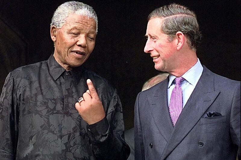articles/2013/12/06/prince-charles-and-the-queen-pay-tribute-to-mandela/mandela-chaz_cdfm3e