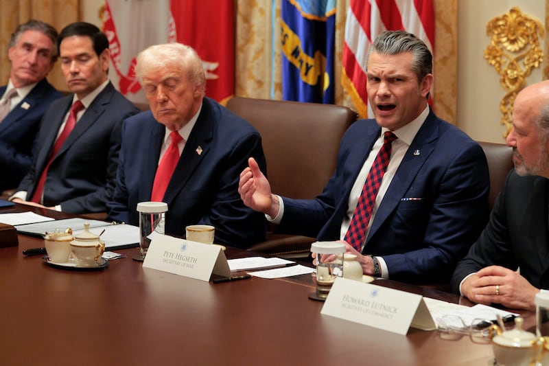 WASHINGTON, DC - DECEMBER 02: U.S. Secretary of War Pete Hegseth (2nd-R) speaks alongside (L-R) U.S. Interior Secretary Doug Burgum, U.S. Secretary of State Marco Rubio, U.S. President Donald Trump and U.S. Secretary of Commerce Howard Lutnick during a Cabinet meeting in the Cabinet Room of the White House on December 02, 2025 in Washington, DC. A bipartisan Congressional investigation has begun regarding Secretary of War Pete Hegseth's role in ordering U.S. military strikes on small boats in the waters off Venezuela that have killed scores of people, which Hegseth said are intended "to stop lethal drugs, destroy narco-boats and kill the narco-terrorists who are poisoning the American people.” (Photo by Chip Somodevilla/Getty Images)