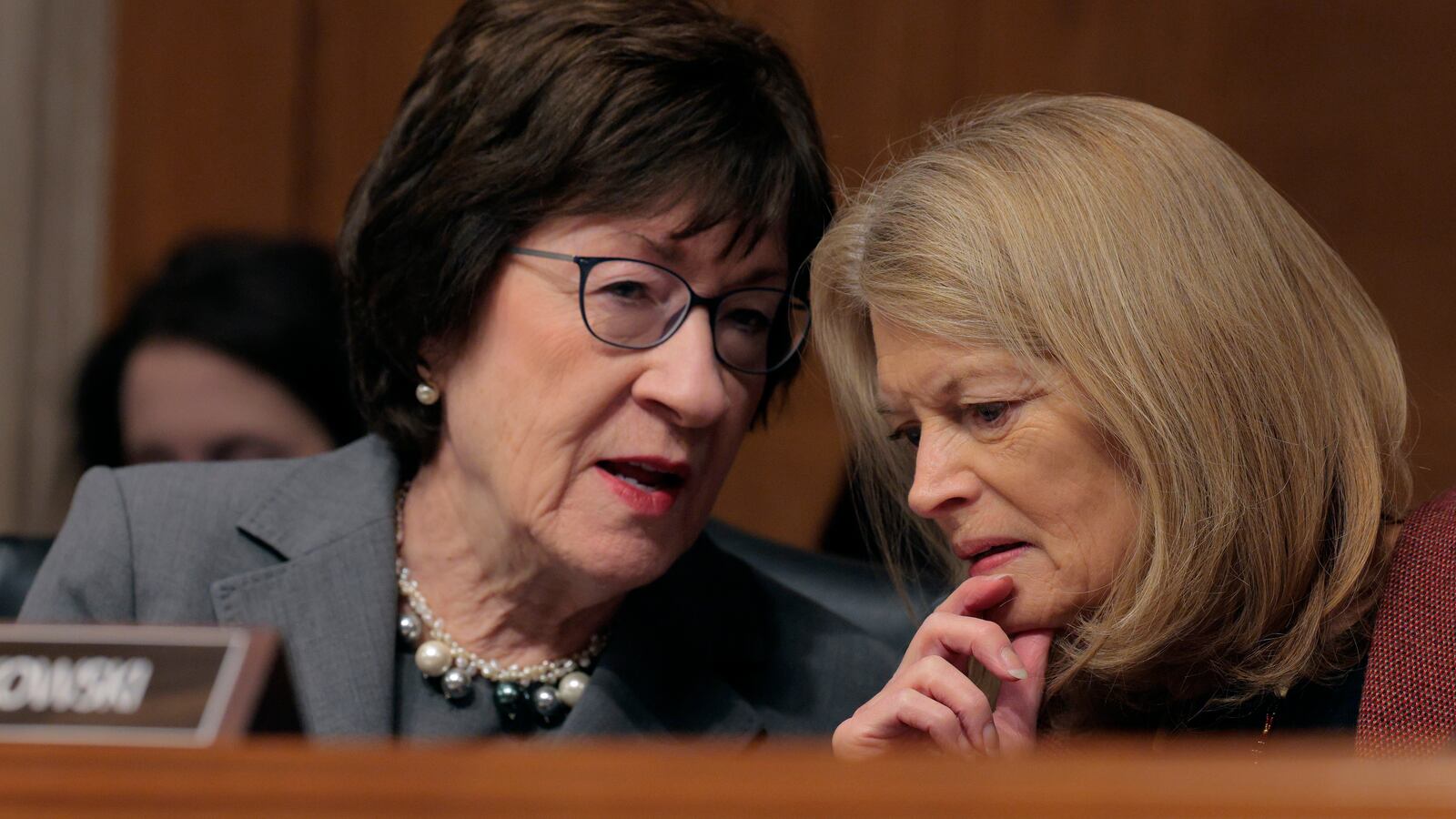 Sen. Susan Collins (L) and Sen. Lisa Murkowski talk during the confirmation hearing for Lori Chavez-DeRemer, President Donald Trump’s pick to lead the Labor Department, in the Dirksen Senate Office Building on Capitol Hill on February 19, 2025 in Washington, DC