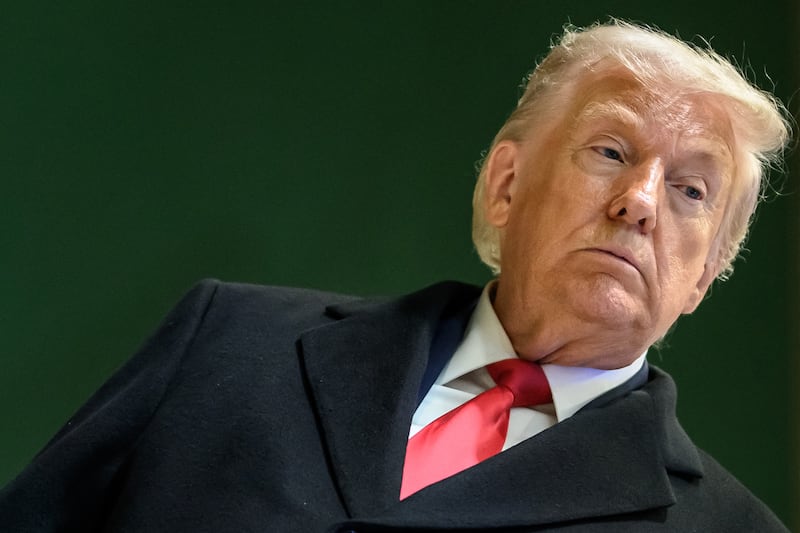 U.S. President Donald Trump looks on as he leaves the congress centre during the World Economic Forum annual meeting in Davos.