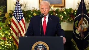 TOPSHOT - US President Donald Trump addresses the nation from the Diplomatic Reception Room of the White House in Washington, DC, on December 17, 2025. (Photo by Doug MILLS / POOL / AFP via Getty Images)