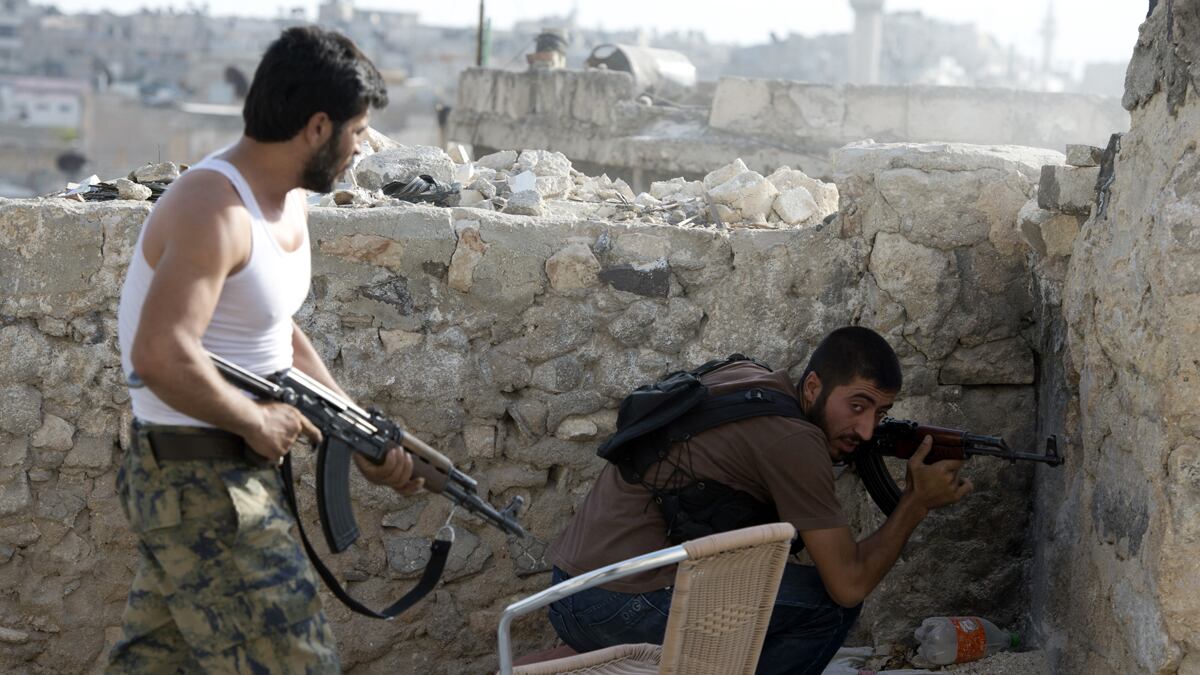 articles/2012/10/05/syrian-rebels-deny-civilian-deaths-in-aleppo-attack-fearful-of-losing-public-support/syria-rebels-tension-giglio_bwdm3y