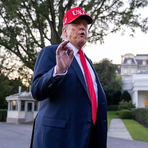 U.S. President Donald Trump talks to the media after walking off Marine One on the South Lawn of the White House on October 05, 2025 in Washington, DC. Trump was returning from a celebration of the Navy’s 250th anniversary in Norfolk, Virginia.  (Photo by Tasos Katopodis/Getty Images)