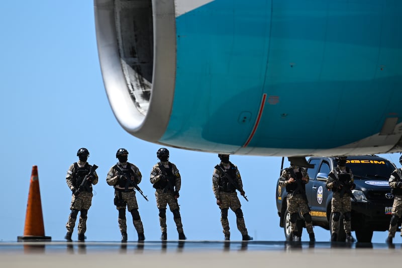 LA GUAIRA, VENEZUELA - JANUARY 19: Members of the Venezuela's General Directorate of Military Counterintelligence stand guard as a flight carrying Venezuelan migrants deported from the United States arrives at Simon Bolivar International Airport in Maiquetia, Venezuela, on January 19, 2026. (Photo by Maxwell Briceno/Anadolu via Getty Images)