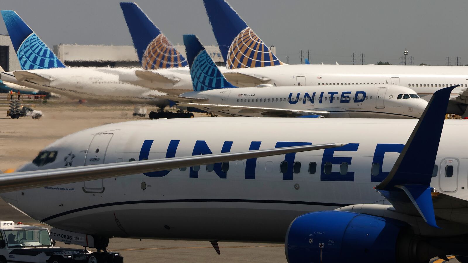 NEWARK, NJ- AUGUST 10: A United Airlines airplane is towed from a gate at Newark Liberty International Airport on August 10, 2025, in Newark, New Jersey.