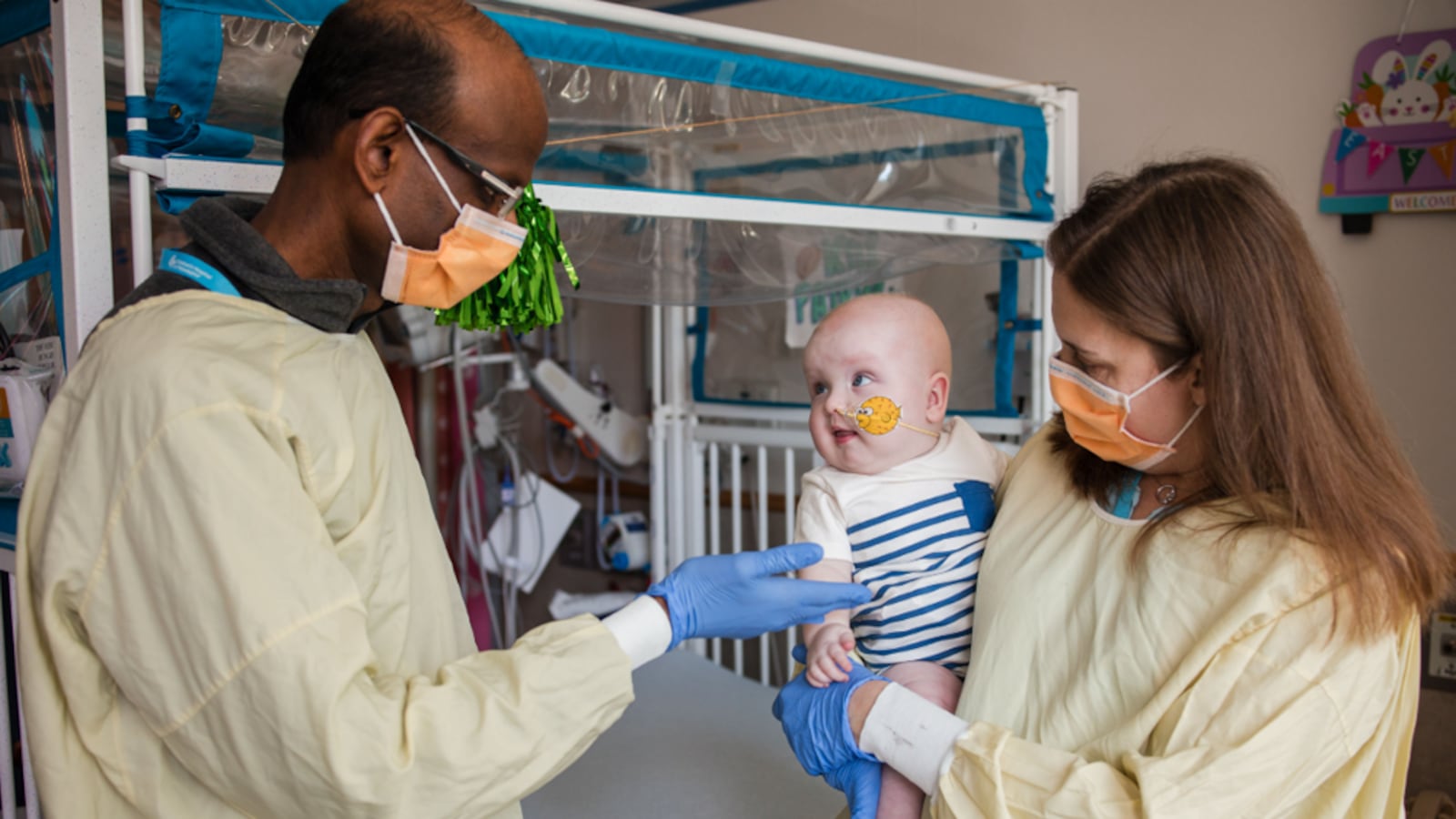 KJ with his doctors Kiran Musunuru and Rebecca Ahrens-Nicklas, who is holding him, at the Children's Hospital of Philadelphia.