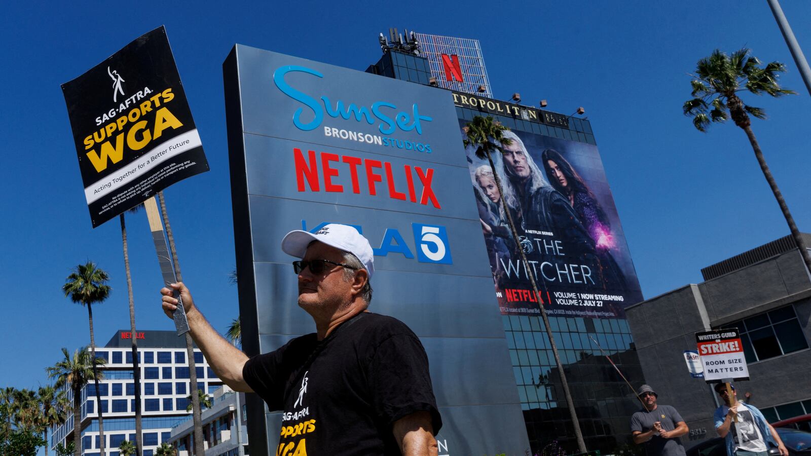 Striking Writers Guild of America (WGA) members walk the picket line in front of Netflix office in Los Angeles, California, U.S., July 12, 2023.