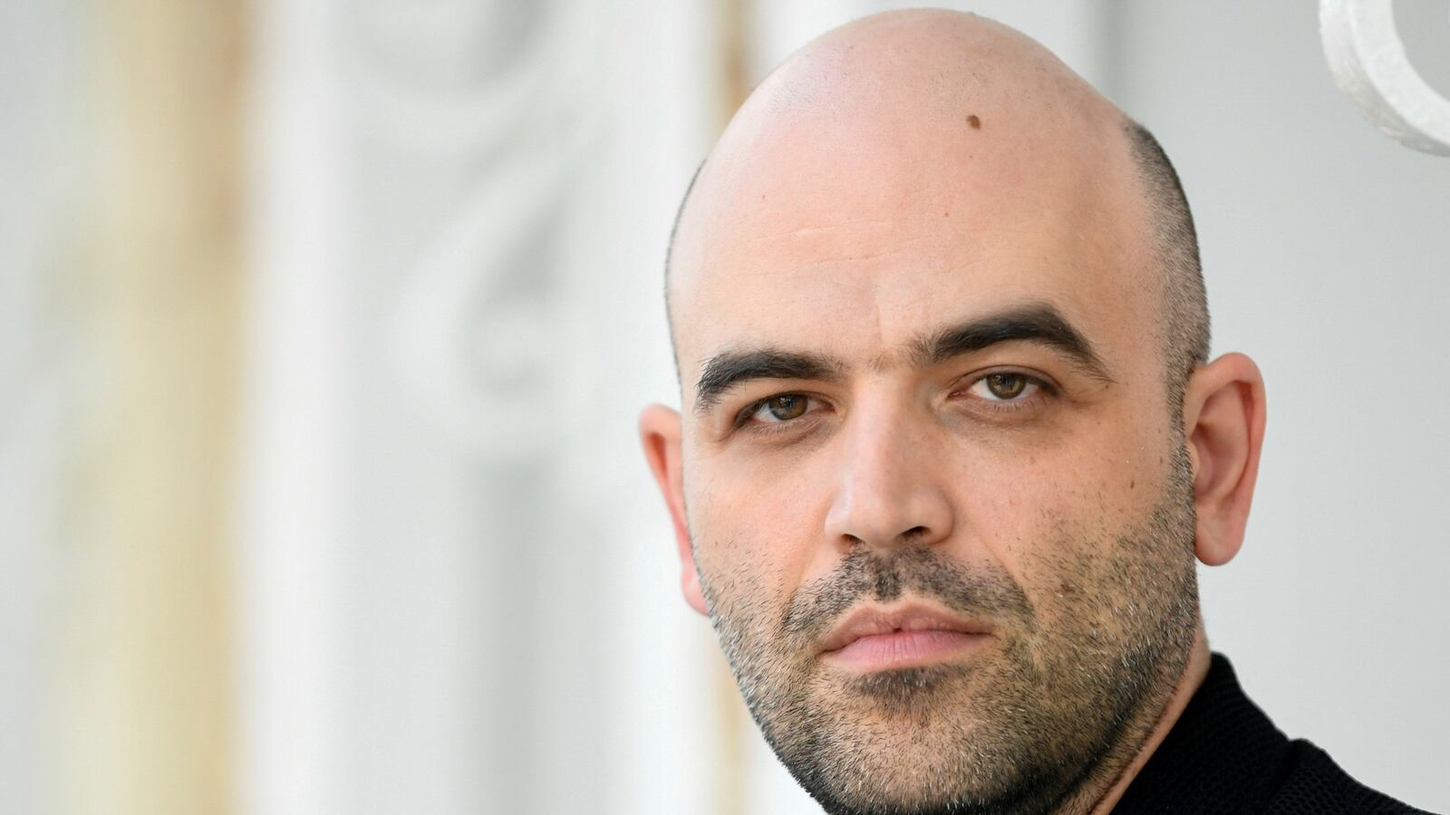 Writer Roberto Saviano poses at 76th Venice Film Festival.