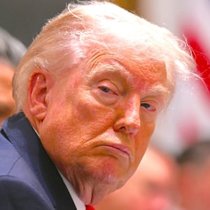 President Donald Trump listens during a cabinet meeting in the Cabinet Room of the White House in Washington, DC, on January 29, 2026.