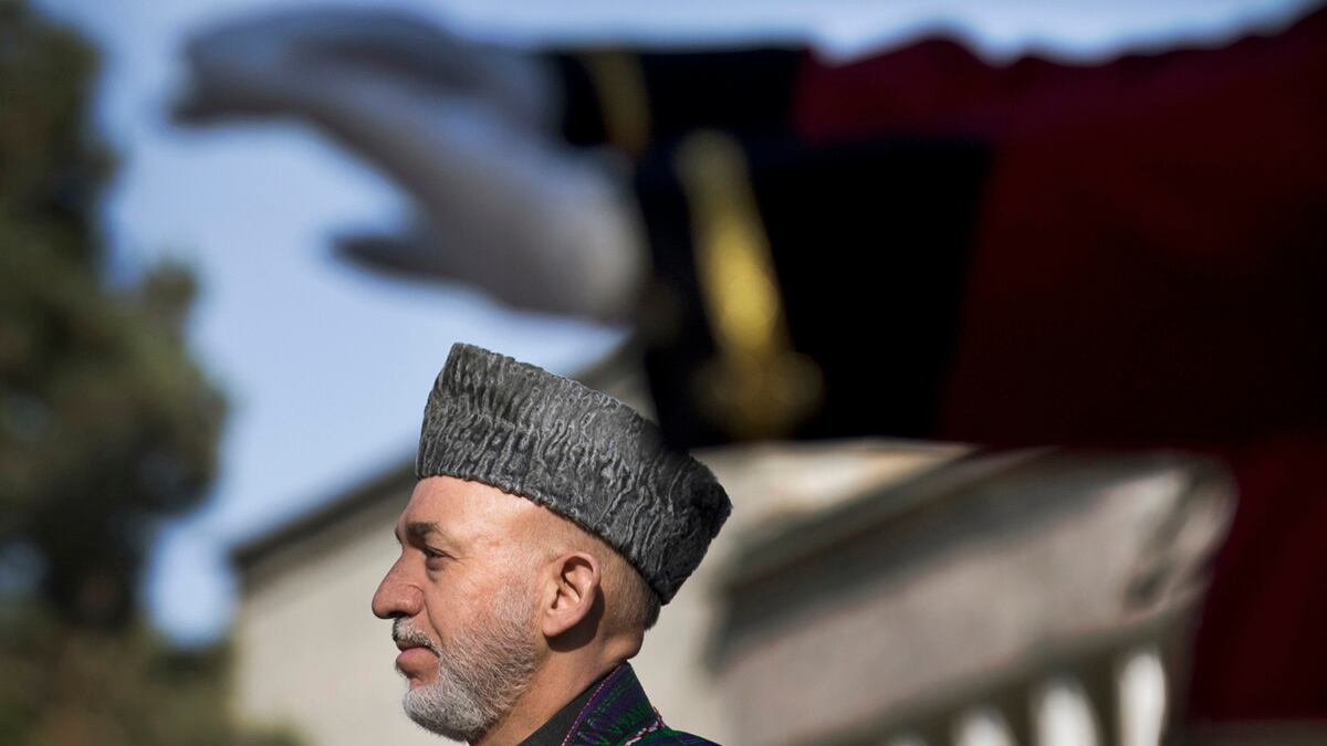 articles/2012/12/08/afghanistan-the-taliban-plot-to-assassinate-karzai/yousafzai-karzai-kill-plot-tease-embed_rwigqd