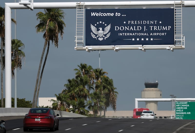 PALM BEACH, FLORIDA - JULY 09: A sign welcomes drivers to the President Donald J. Trump International Airport on July 09, 2026, in Palm Beach, Florida. The airport formerly known as Palm Beach International Airport has officially been renamed President Donald J. Trump International Airport. Several airports across the country are named after past presidents, but President Trump is the first president to have an airport named after him while still in office. (Photo by Joe Raedle/Getty Images)