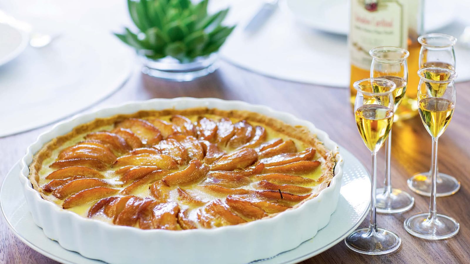 articles/2013/10/15/daniel-boulud-reveals-his-4-favorite-recipes-from-his-new-cookbook/131011-best-recipes-tarte-normande-embed_nppwyu
