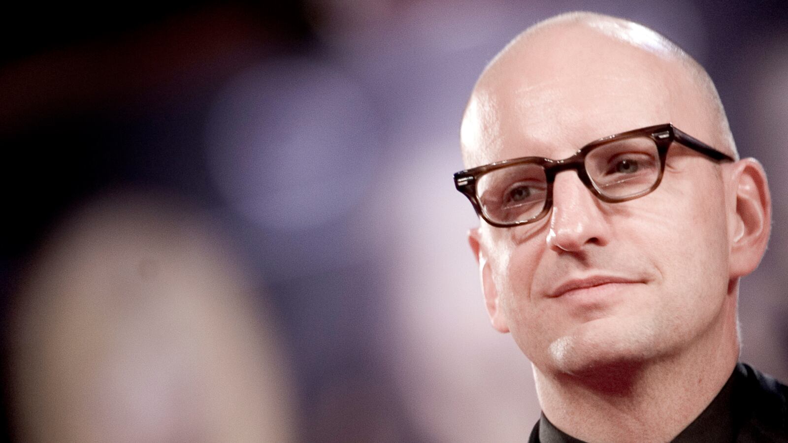 articles/2014/08/01/the-director-isn-t-finished-yet-an-interview-with-steven-soderbergh/140731-romano-steven-tease_segbqc
