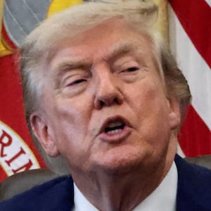 U.S. President Donald Trump, with White House Deputy Chief of Staff Stephen Miller, speaks during an event to sign executive orders related to birthright citizenship and the polysilicon industry, in the Oval Office at the White House in Washington, D.C., U.S., August 6, 2026.